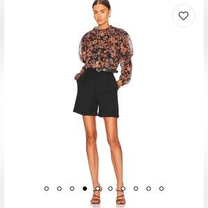 EUC Clarissa Printed Top in Midnight Combo
Free People. Size Small.